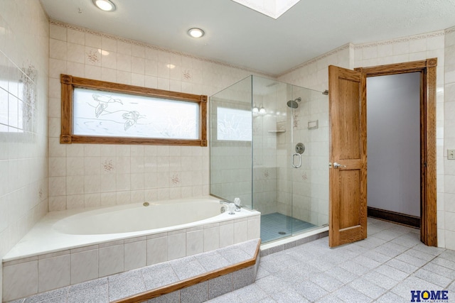 8240 Dorset Dr, Lincoln, NE 68510 - bathroom with a garden tub and a stall shower