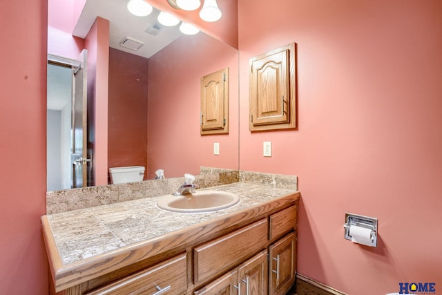 8240 Dorset Dr, Lincoln, NE 68510 - bathroom with toilet and vanity