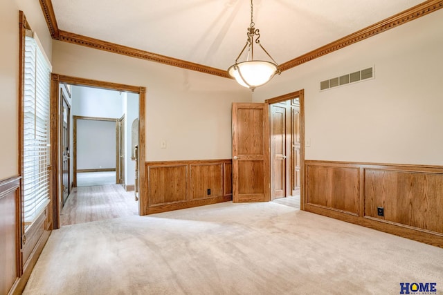 8240 Dorset Dr, Lincoln, NE 68510 - unfurnished room with crown molding and a wainscoted wall