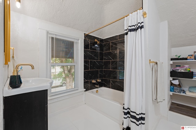 1512 N 41st Ave, Omaha, NE 68111 - full bathroom with a textured ceiling, shower / bath combo with shower curtain, and vanity