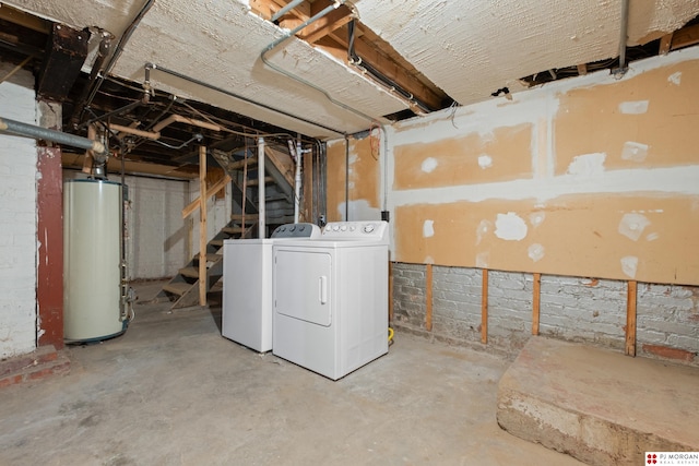 1512 N 41st Ave, Omaha, NE 68111 - unfinished basement featuring water heater, washing machine and clothes dryer, and stairway