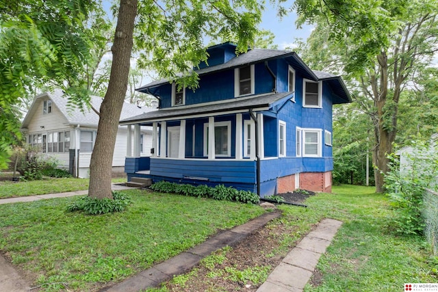 1512 N 41st Ave, Omaha, NE 68111 - traditional style home featuring a front lawn and a shingled roof
