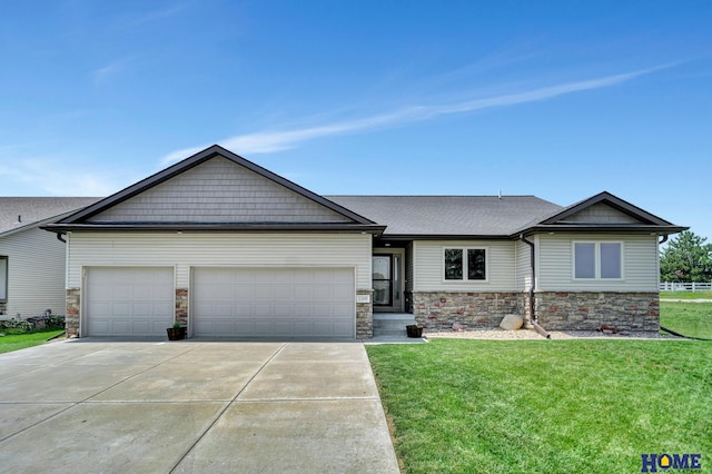 1309 Ridge Rd, Hickman, NE 68372 - view of front facade featuring stone siding, an attached garage, driveway, and a front yard