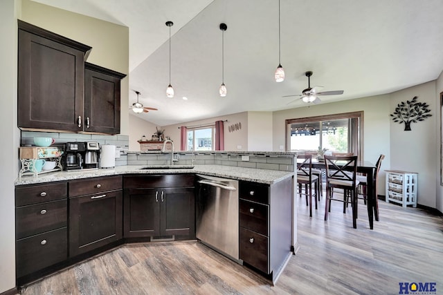 1309 Ridge Rd, Hickman, NE 68372 - kitchen with stainless steel dishwasher, ceiling fan, a peninsula, healthy amount of natural light, and lofted ceiling