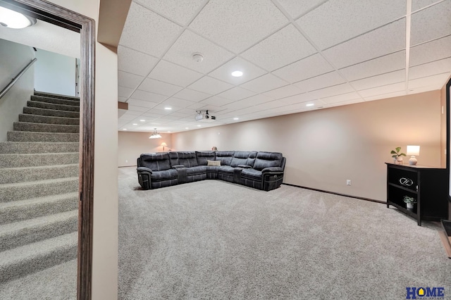 1309 Ridge Rd, Hickman, NE 68372 - carpeted living area with recessed lighting, stairs, and a drop ceiling