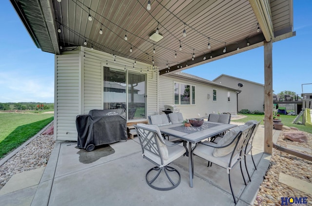 1309 Ridge Rd, Hickman, NE 68372 - view of patio featuring outdoor dining space and grilling area