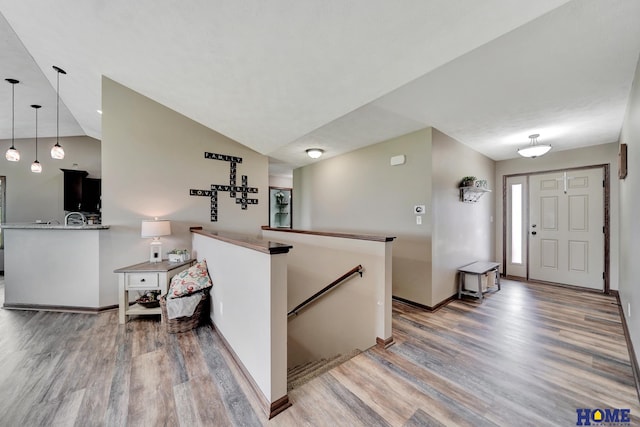 1309 Ridge Rd, Hickman, NE 68372 - foyer with light wood-type flooring and lofted ceiling