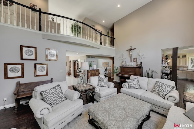 5100 Bridle Ln, Lincoln, NE 68516 - living area with a towering ceiling, wood finished floors, baseboards, and recessed lighting