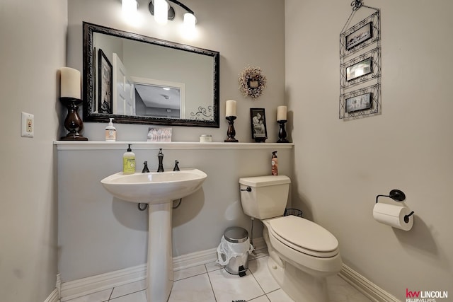 5100 Bridle Ln, Lincoln, NE 68516 - bathroom with toilet, baseboards, and tile patterned flooring