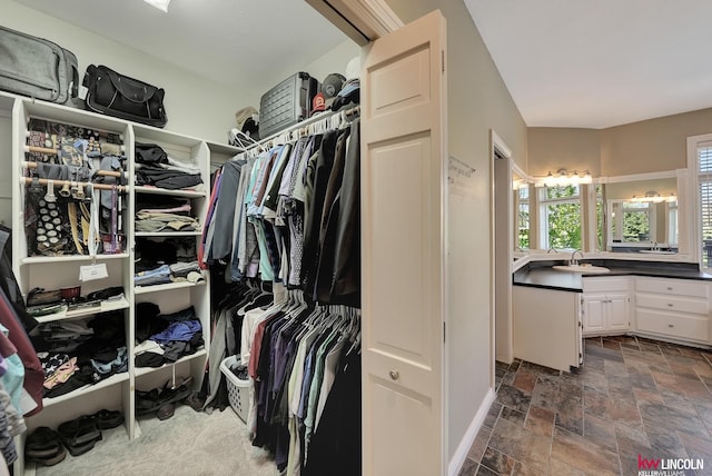 5100 Bridle Ln, Lincoln, NE 68516 - spacious closet featuring stone tile flooring and a sink