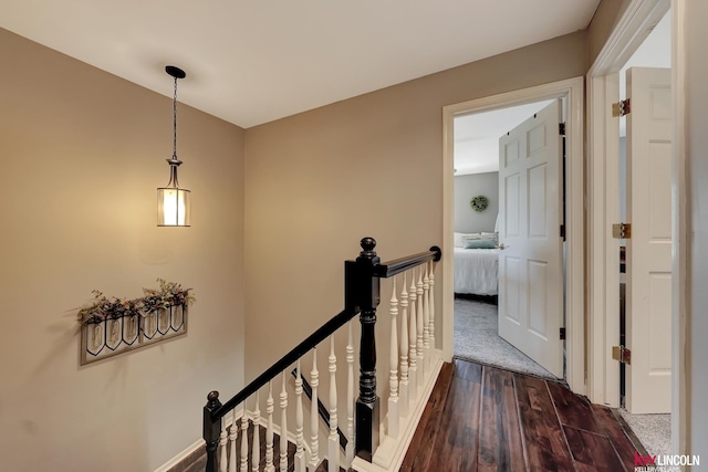 5100 Bridle Ln, Lincoln, NE 68516 - hall with an upstairs landing, wood finished floors, and baseboards