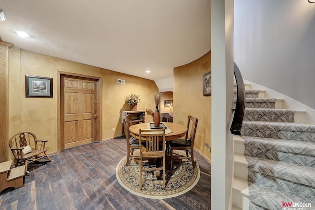 5100 Bridle Ln, Lincoln, NE 68516 - dining area featuring dark wood-type flooring, stairway, recessed lighting, and baseboards