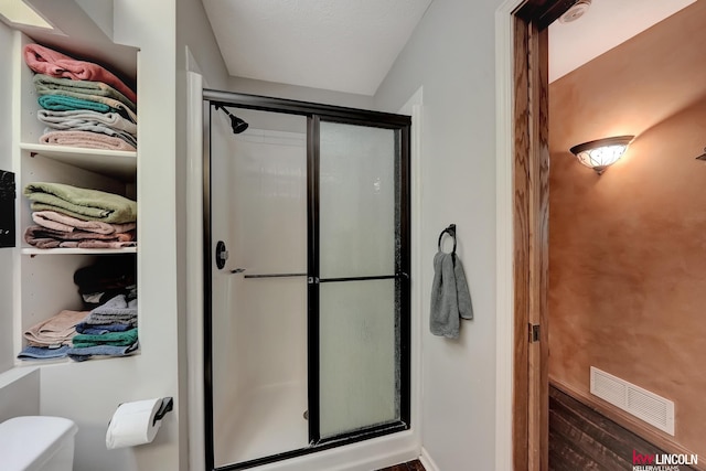 5100 Bridle Ln, Lincoln, NE 68516 - bathroom with a shower stall and toilet