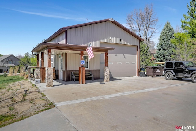 5100 Bridle Ln, Lincoln, NE 68516 - view of front of house with a detached garage and board and batten siding