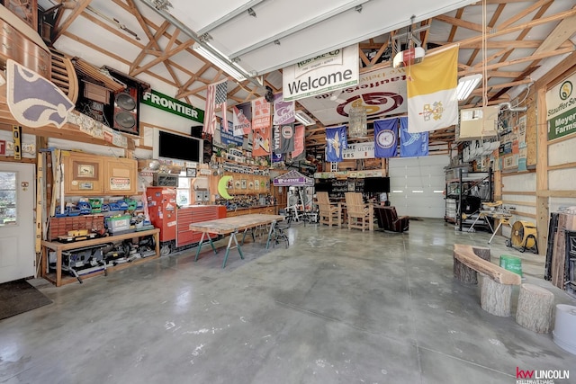 5100 Bridle Ln, Lincoln, NE 68516 - garage featuring a workshop area
