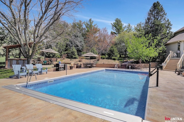 5100 Bridle Ln, Lincoln, NE 68516 - view of swimming pool featuring a patio and stairs
