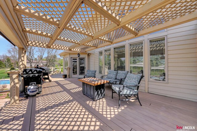 5100 Bridle Ln, Lincoln, NE 68516 - wooden terrace with a pergola and an outdoor hangout area