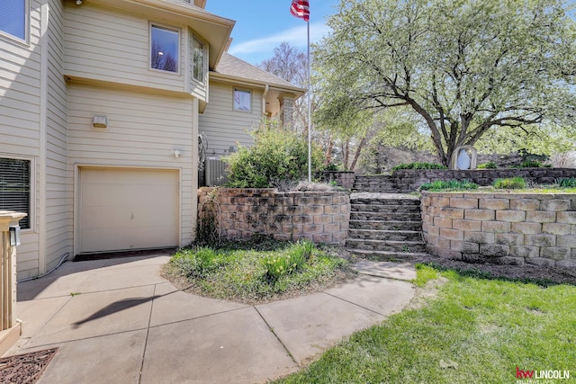 5100 Bridle Ln, Lincoln, NE 68516 - view of home's exterior with driveway and a garage
