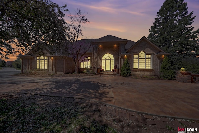 5100 Bridle Ln, Lincoln, NE 68516 - view of front of home with brick siding and concrete driveway