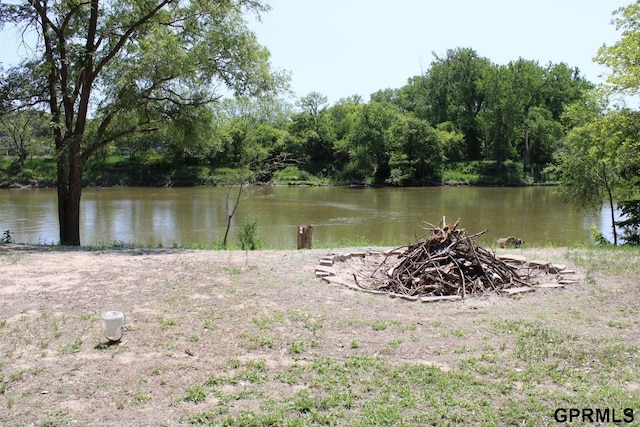 23809 F Plz Unit 9, Waterloo, NE 68069 - water view featuring a fire pit
