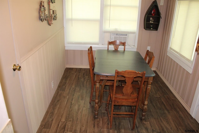 23809 F Plz Unit 9, Waterloo, NE 68069 - dining area featuring wood finished floors, cooling unit, wainscoting, and a decorative wall
