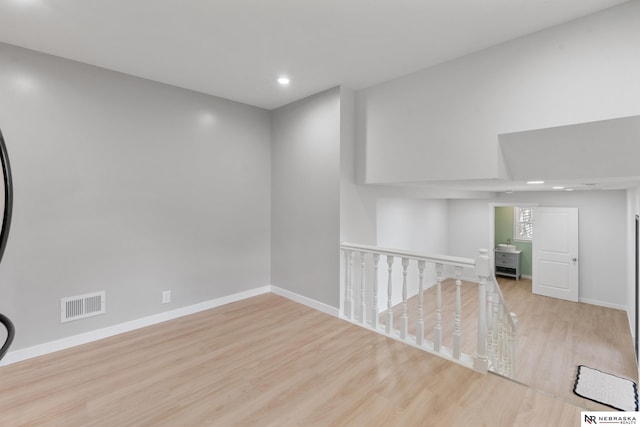 14611 Holmes St, Omaha, NE 68137 - empty room featuring wood finished floors, baseboards, and recessed lighting