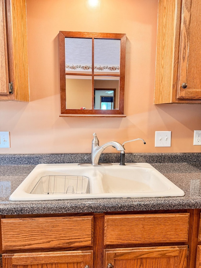1881 Meadow Ln, Seward, NE 68434 - kitchen view of a sink and dark countertops