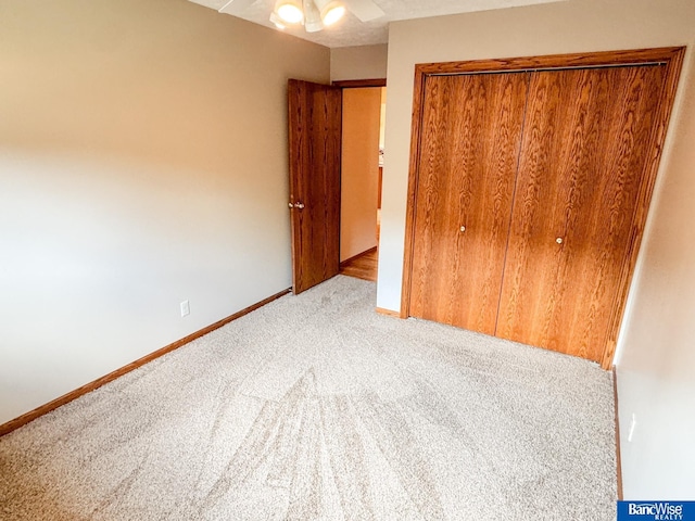1881 Meadow Ln, Seward, NE 68434 - unfurnished bedroom with carpet floors, a closet, and baseboards