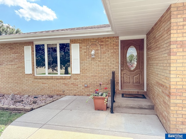 1881 Meadow Ln, Seward, NE 68434 - property entrance featuring brick siding