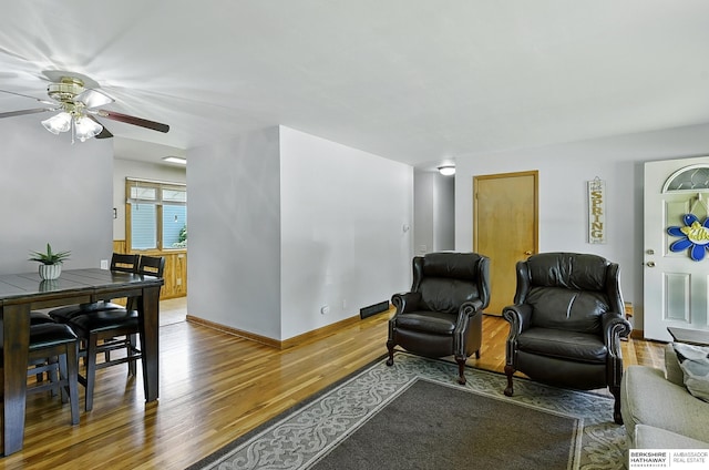8345 Burt St, Omaha, NE 68114 - living room with wood finished floors and ceiling fan