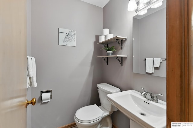 8345 Burt St, Omaha, NE 68114 - bathroom featuring toilet and a sink
