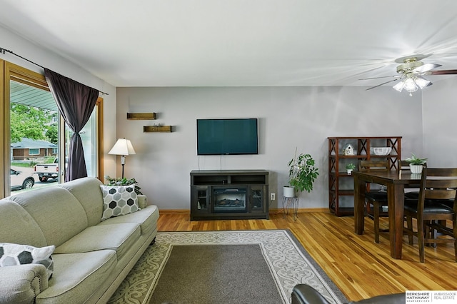 8345 Burt St, Omaha, NE 68114 - living room with wood finished floors and ceiling fan