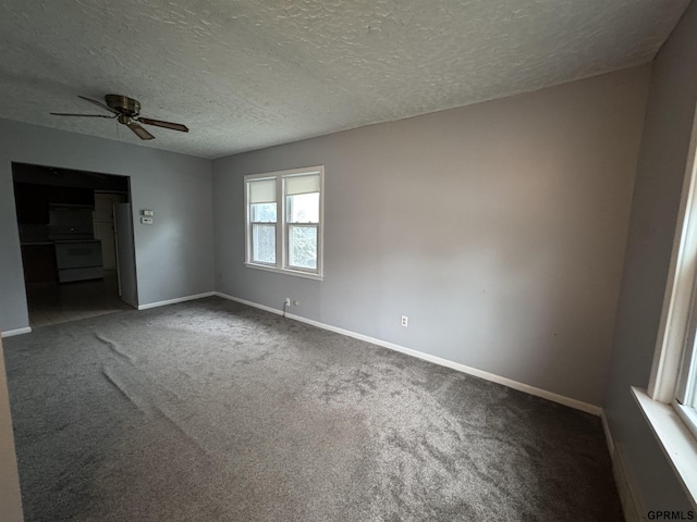 6035 Woolworth Ave, Omaha, NE 68106 - spare room with ceiling fan, carpet flooring, baseboards, and a textured ceiling