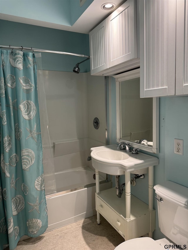 6035 Woolworth Ave, Omaha, NE 68106 - bathroom featuring shower / bath combo with shower curtain and toilet