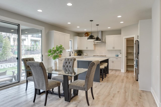 5807 N Hws Cleveland Blvd, Omaha, NE 68116 - dining space featuring healthy amount of natural light, recessed lighting, and light wood-type flooring