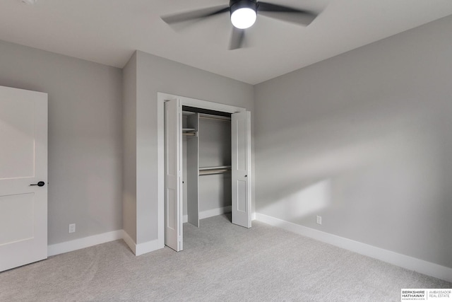 5807 N Hws Cleveland Blvd, Omaha, NE 68116 - unfurnished bedroom featuring carpet, baseboards, a closet, and ceiling fan