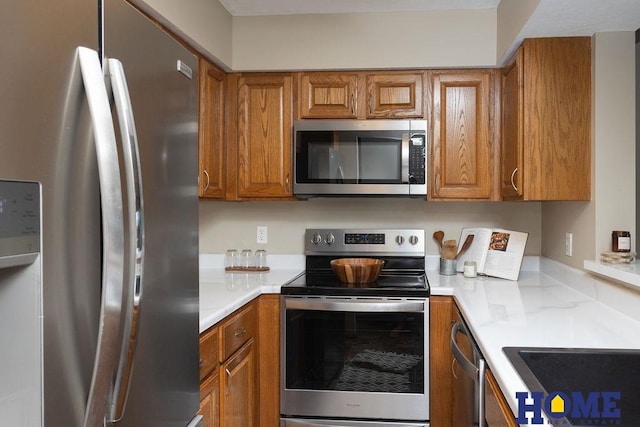 6207 Benjamin Pl, Lincoln, NE 68516 - kitchen with stainless steel appliances and brown cabinets