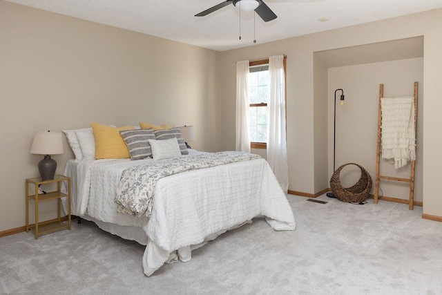 6207 Benjamin Pl, Lincoln, NE 68516 - bedroom featuring light carpet, baseboards, and a ceiling fan