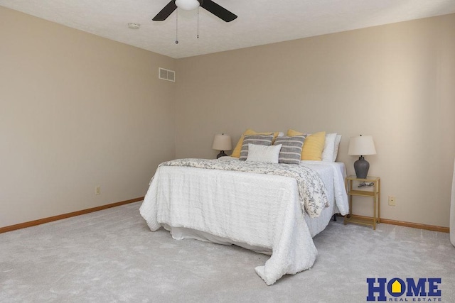 6207 Benjamin Pl, Lincoln, NE 68516 - carpeted bedroom with baseboards and a ceiling fan