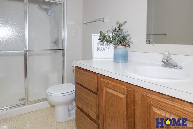 6207 Benjamin Pl, Lincoln, NE 68516 - full bathroom with vanity, a shower stall, toilet, and tile patterned floors