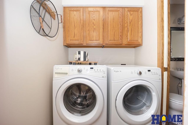 6207 Benjamin Pl, Lincoln, NE 68516 - laundry room with independent washer and dryer and cabinet space
