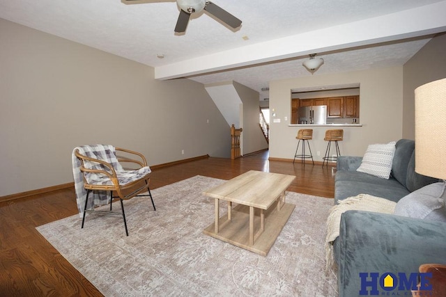 6207 Benjamin Pl, Lincoln, NE 68516 - living room featuring beam ceiling, a ceiling fan, baseboards, and wood finished floors