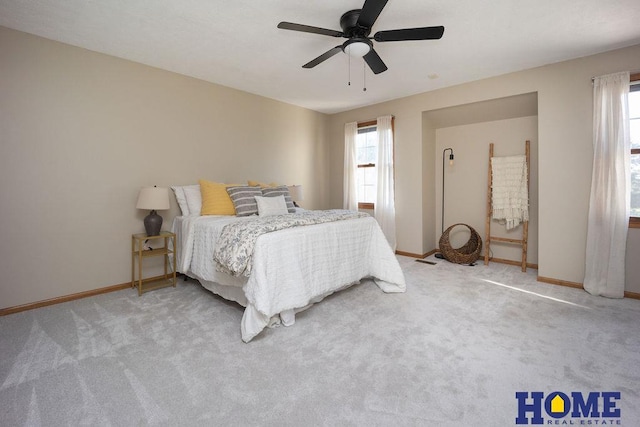 6207 Benjamin Pl, Lincoln, NE 68516 - carpeted bedroom with baseboards and a ceiling fan