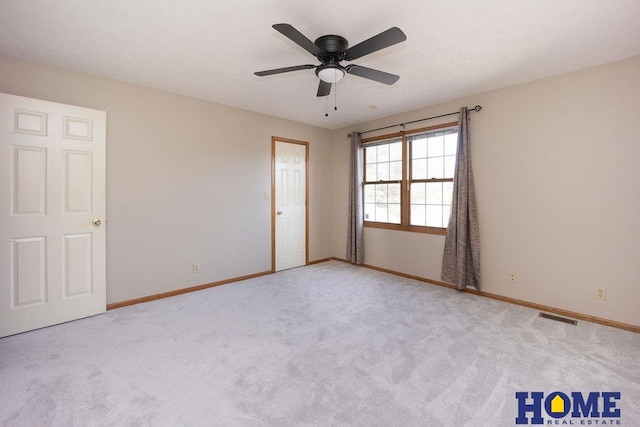 6207 Benjamin Pl, Lincoln, NE 68516 - empty room with baseboards, carpet flooring, and a ceiling fan