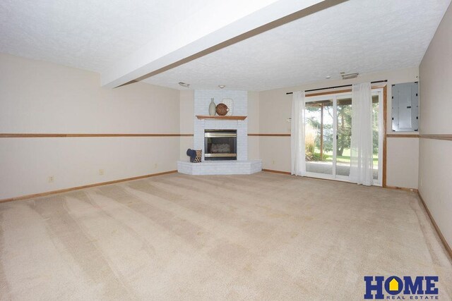 6207 Benjamin Pl, Lincoln, NE 68516 - unfurnished living room featuring electric panel, a fireplace, baseboards, carpet floors, and beam ceiling