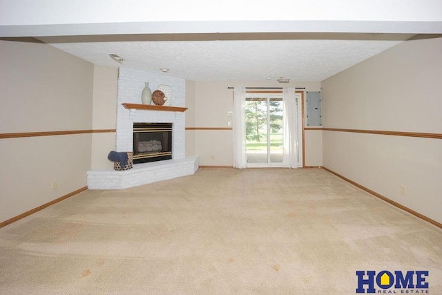 6207 Benjamin Pl, Lincoln, NE 68516 - unfurnished living room featuring a brick fireplace, carpet, baseboards, electric panel, and a textured ceiling