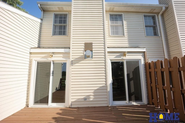 6207 Benjamin Pl, Lincoln, NE 68516 - back of house with a wooden deck and a chimney
