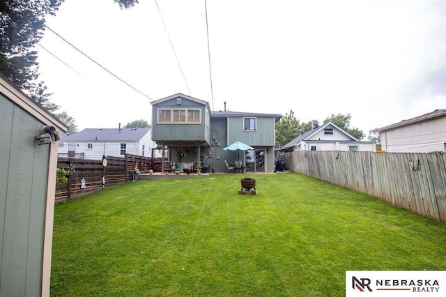 5431 S 48th Ave, Omaha, NE 68117 - view of yard featuring a fire pit