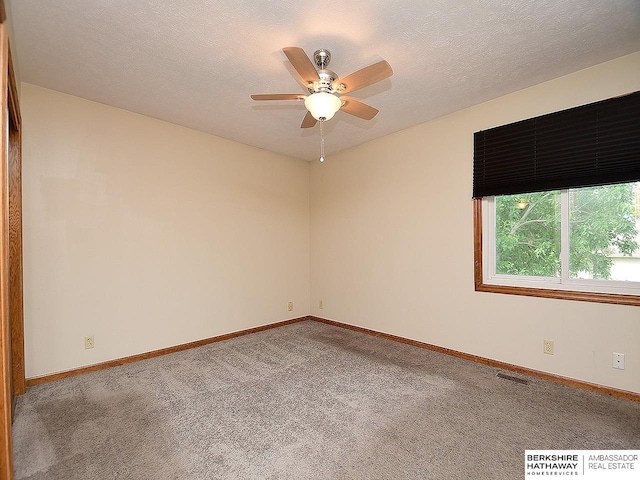 15211 Pasadena Ave, Omaha, NE 68144 - empty room featuring a ceiling fan and carpet floors