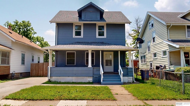2597 Pinkney St, Omaha, NE 68111 - traditional style home with covered porch and a shingled roof